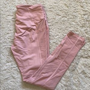 Light pink leggings with mesh and pockets